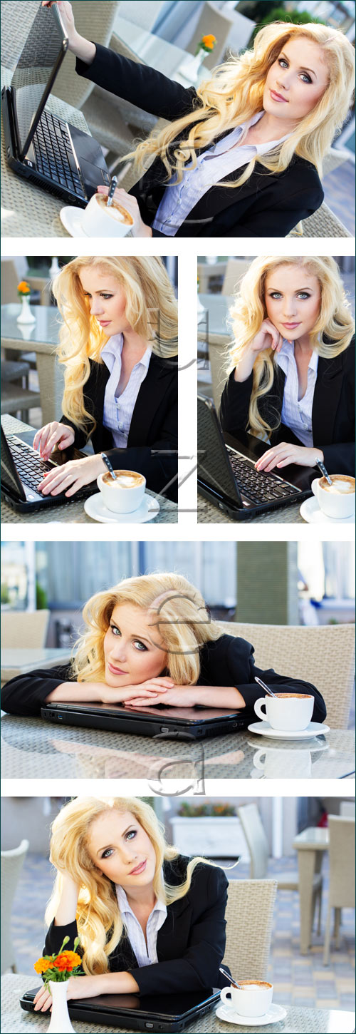      / Young pretty business woman with notebook - stock photo